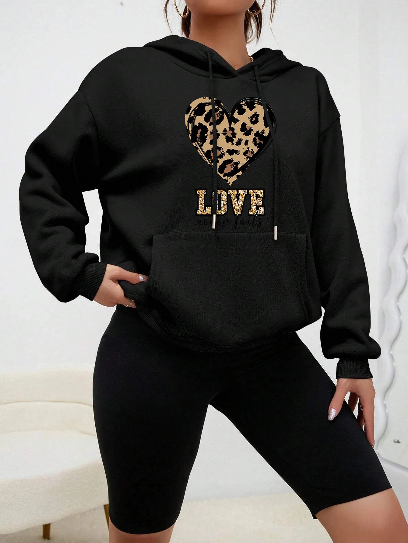 Love Never Fails Women's Hoodie