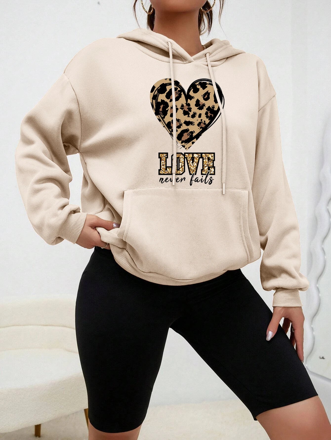 Love Never Fails Women's Hoodie