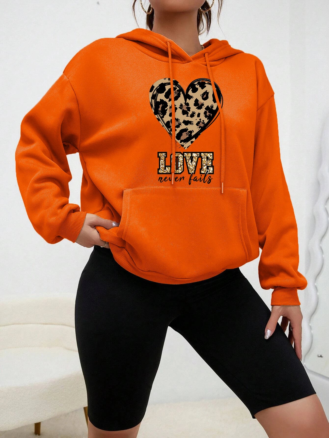 Love Never Fails Women's Hoodie